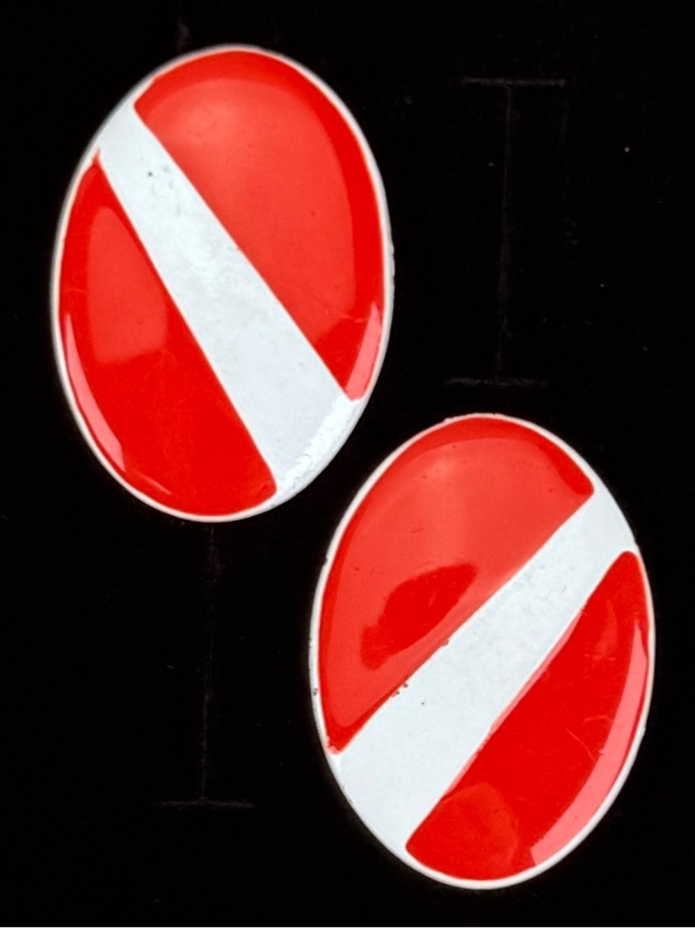 Super fun, red and white weighted vintage clip on earrings